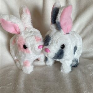 Buddy bunnies 
One pink and white 
One grey and white 
New